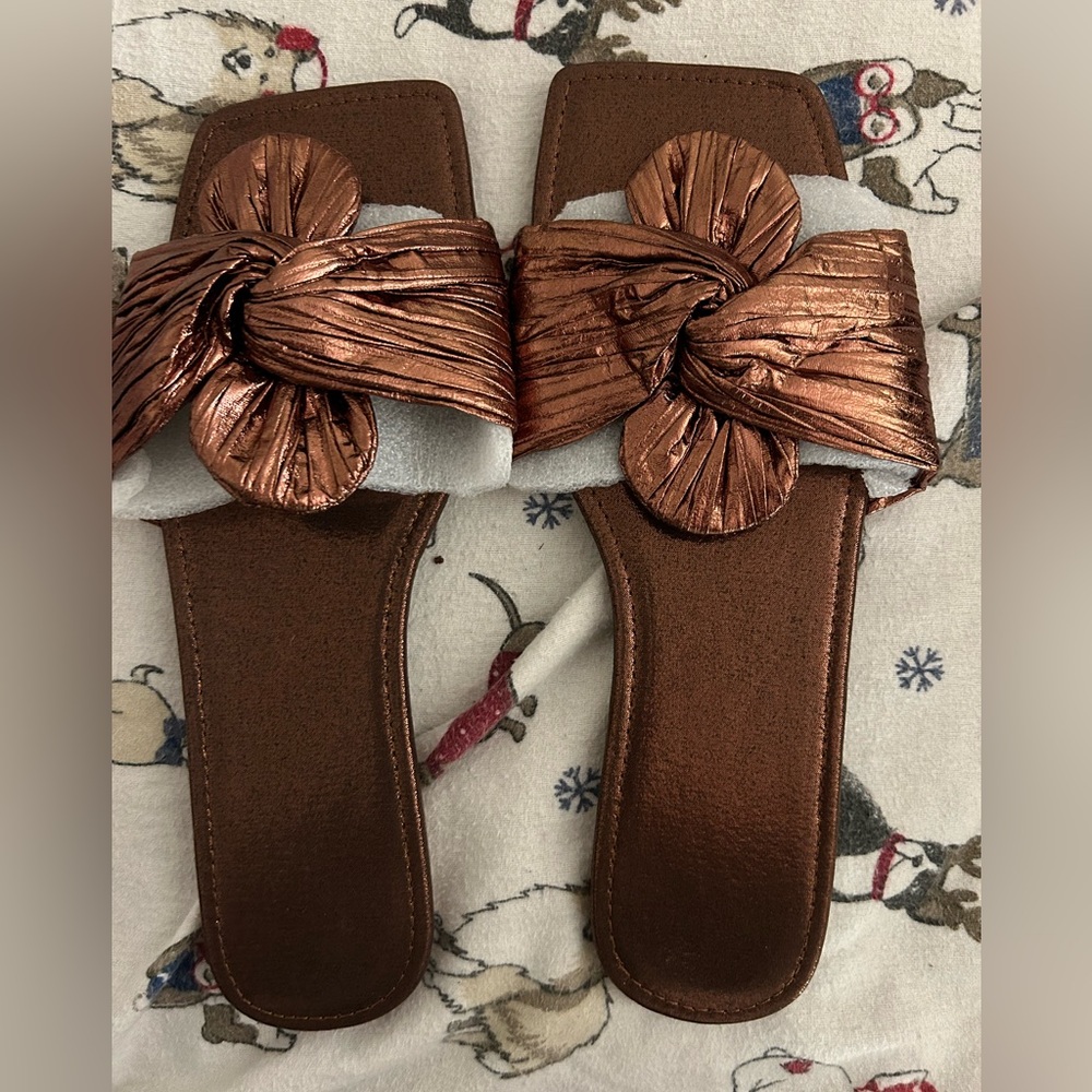 BRAND NEW!! Size10.5 woman’s brown slides/sandels brown, shiny metallic bow